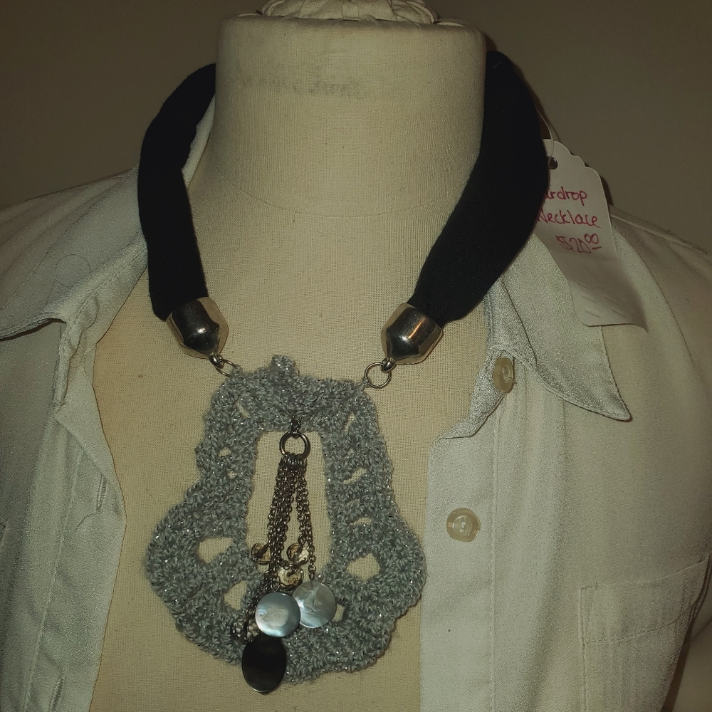 Hand crocheted necklace charm on black choker